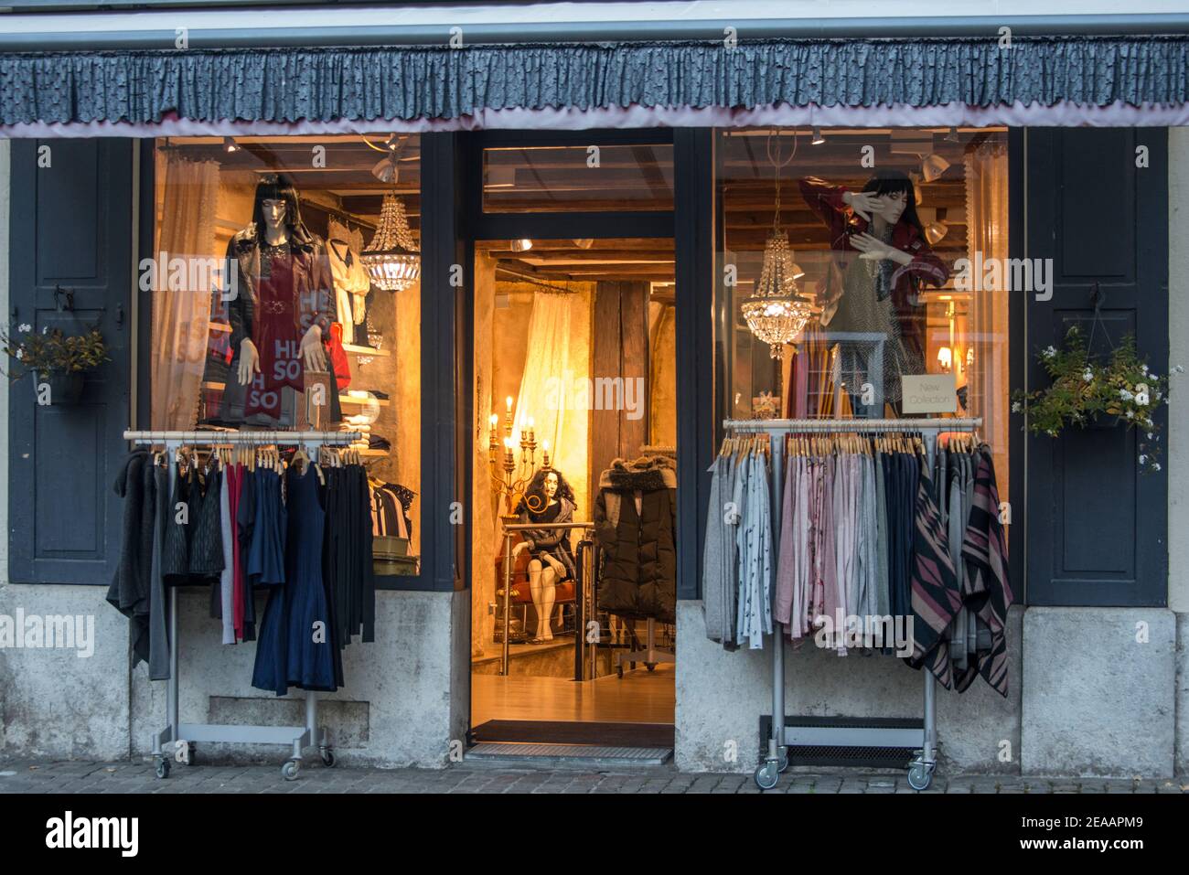 Boutique shop window in Solothurn in the evening Stock Photo