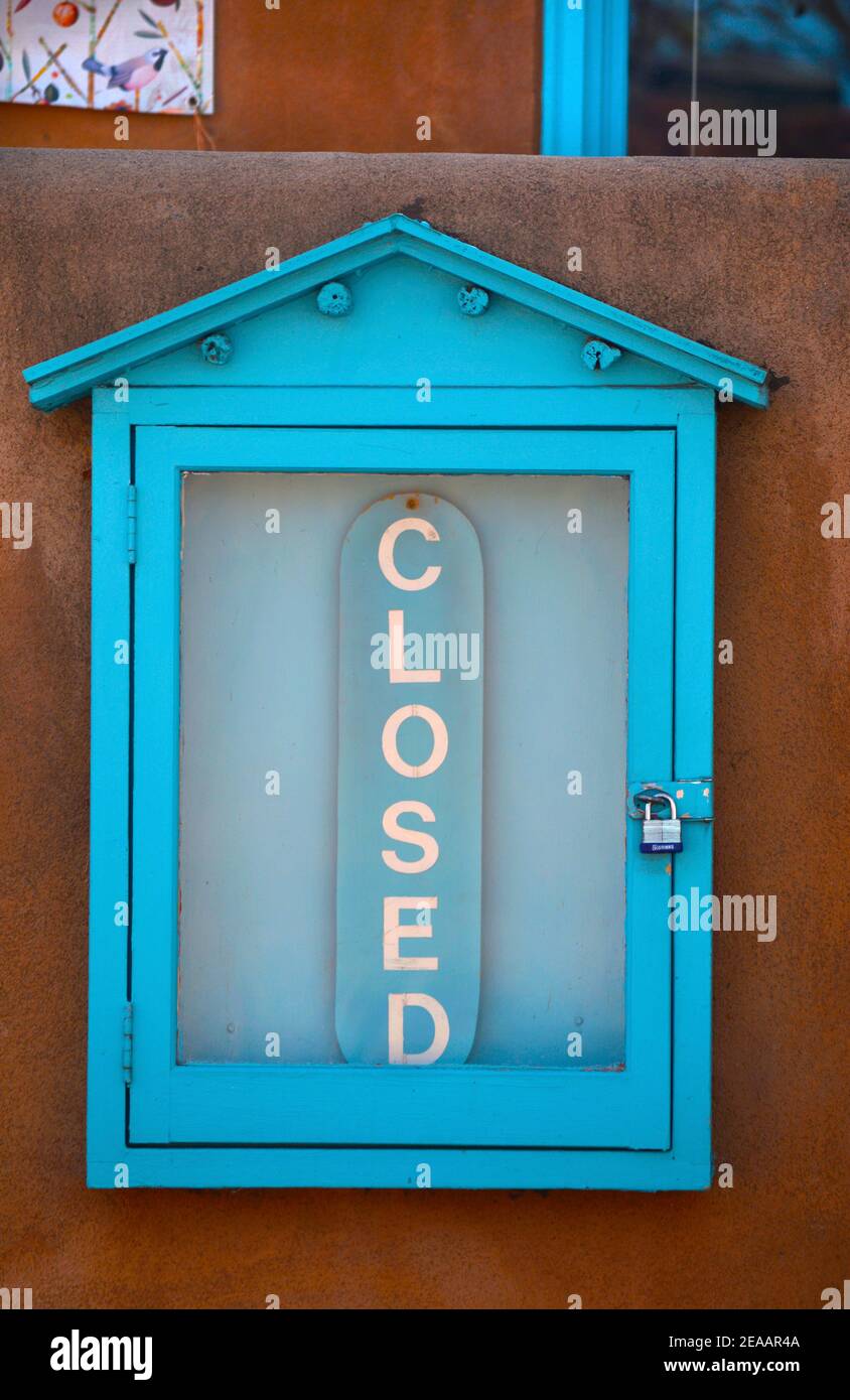 A Closed sign in front of a shop in Santa Fe, New Mexico USA. Stock Photo
