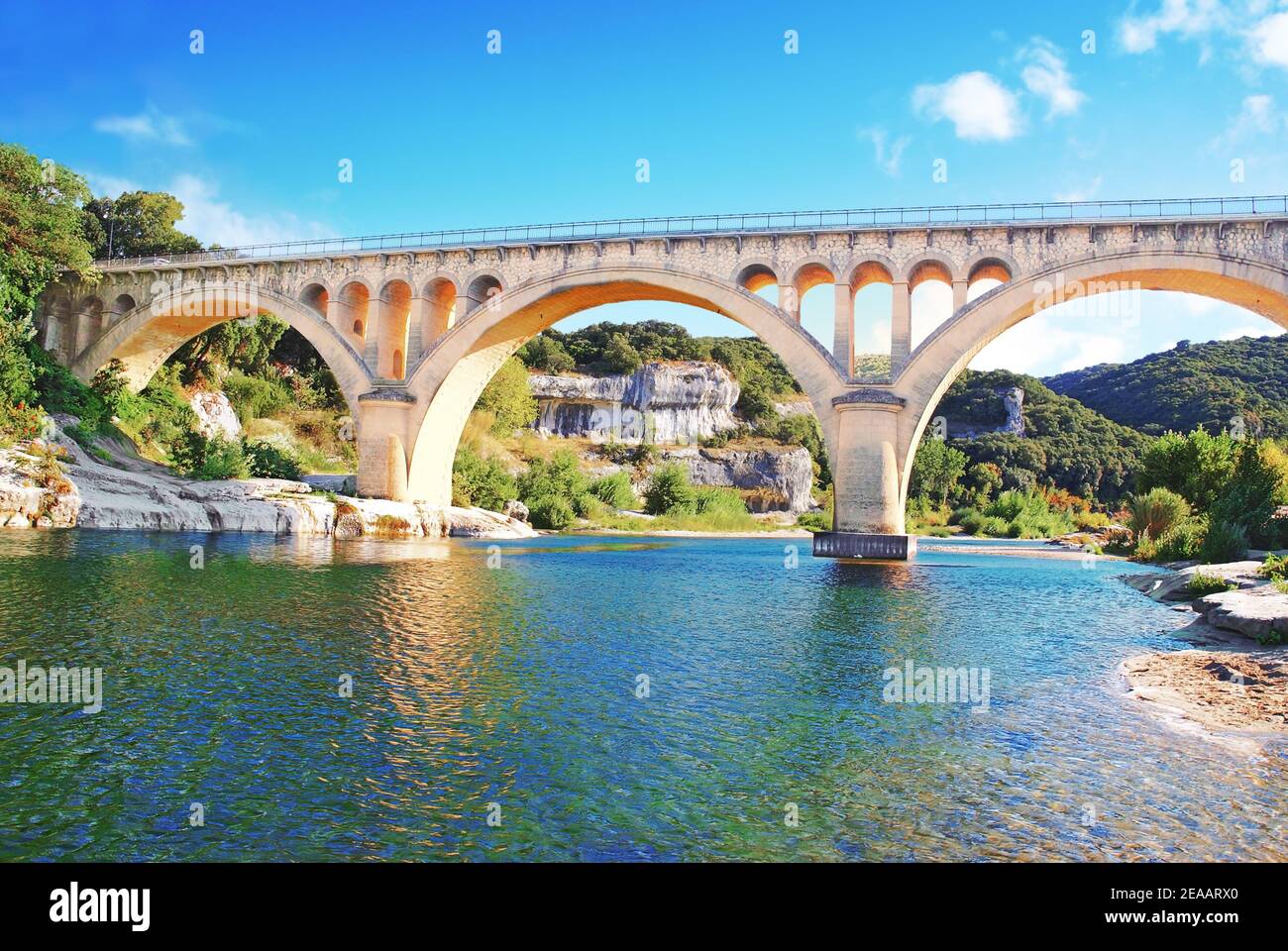 Architecture of the Collias bridge on the Gard river in Occitanie France. Stock Photo