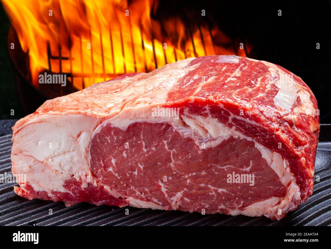 Raw rib fillet with grill in the background Stock Photo - Alamy