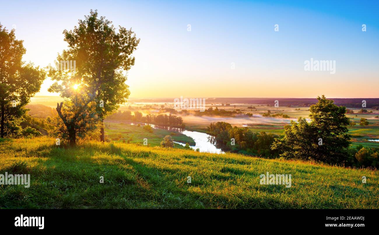 Beautiful sundown over the river in summer Stock Photo