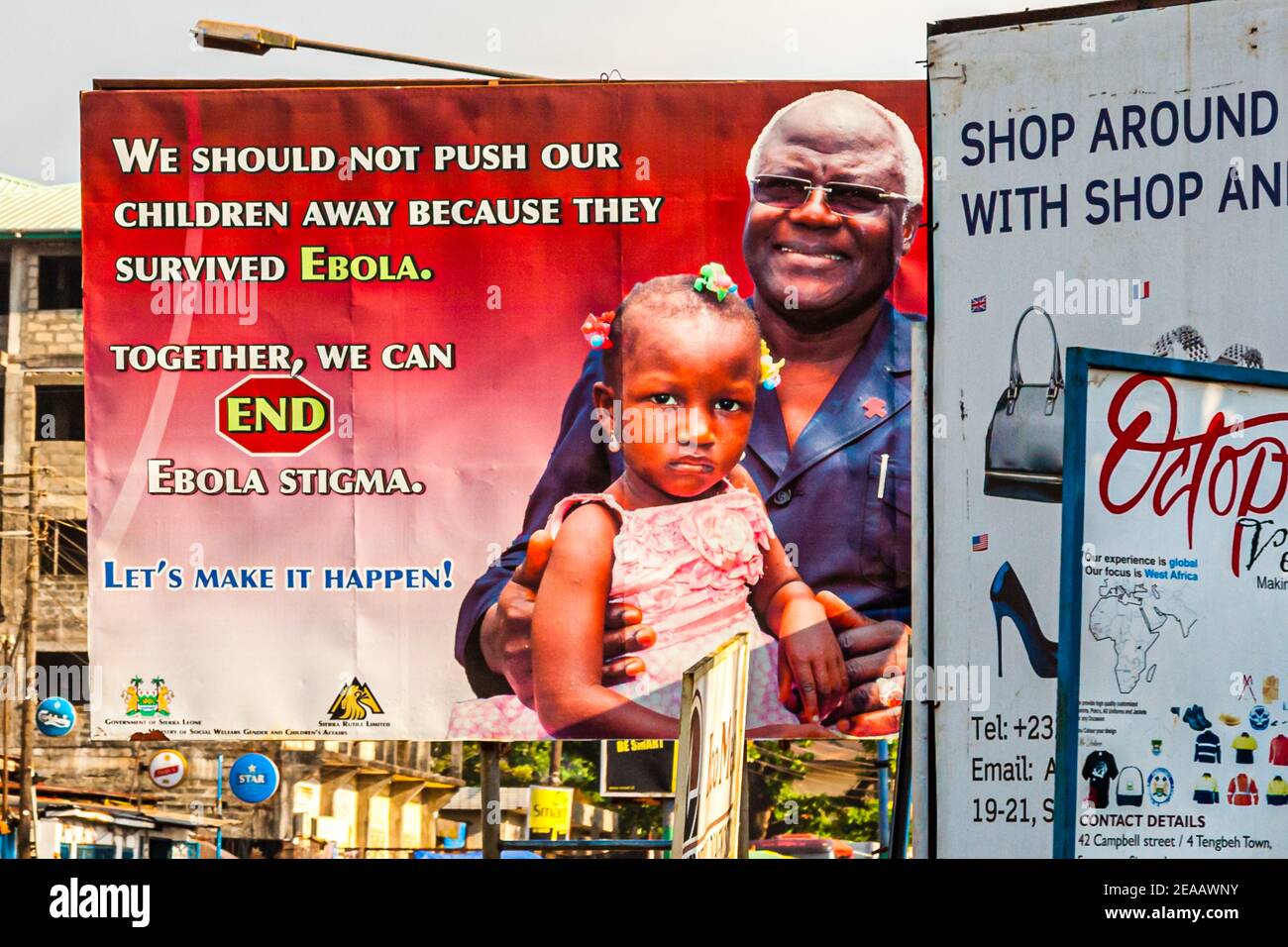 Billboard featuring President Ernest Koroma of Sierra Leone with Ebola Orphan. Sierra Leone's President Ernest Bai Koroma advocates for Ebola orphans on posters Stock Photo