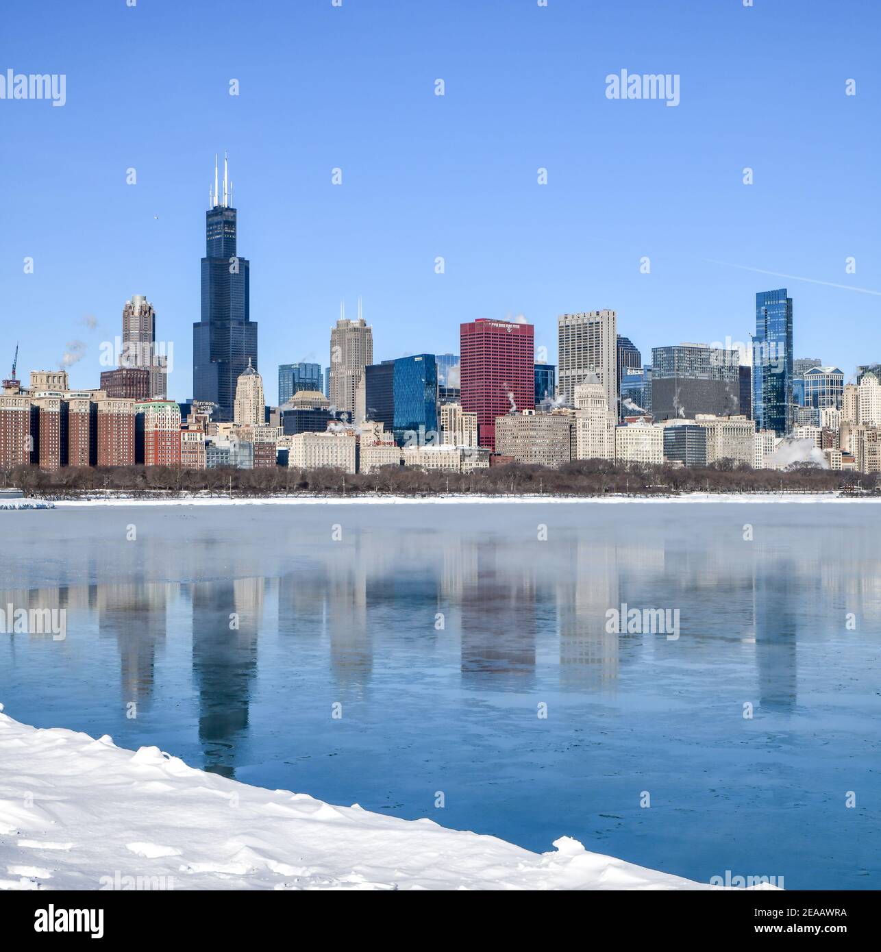 Chicago city skyline along frozen lakeshore in winter Stock Photo - Alamy