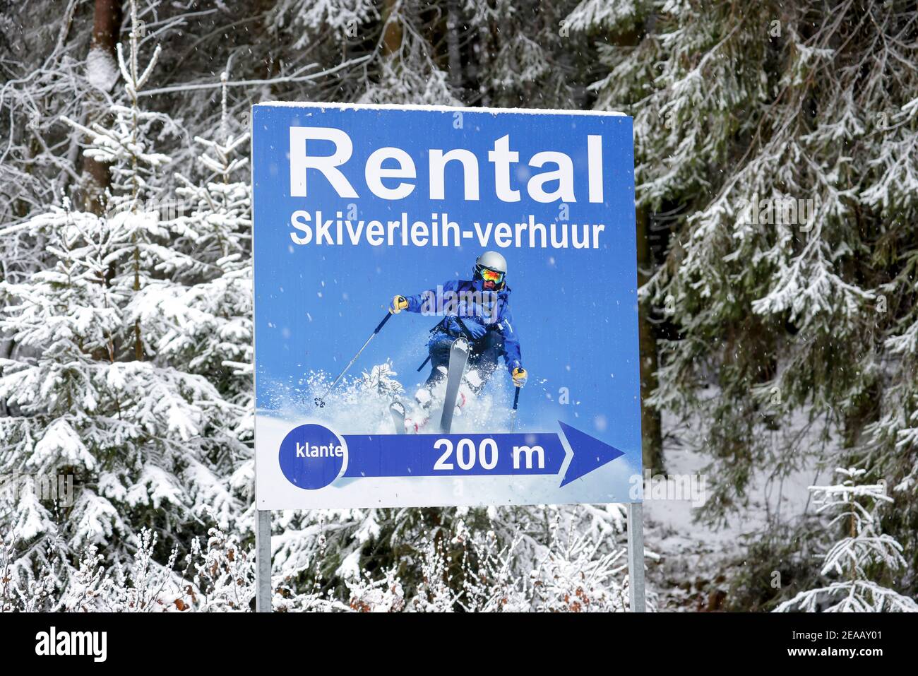 December 7th, 2020, Winterberg, Sauerland, North Rhine-Westphalia, Germany, Snow-covered sign ski rental, information sign in Dutch for the many Dutch ski tourists, no winter sports in Winterberg during the corona crisis during the second part of the lockdown, ski lifts remain in accordance with the new Corona -Schutzverordnung in NRW closed. 00X201207D037CARO [MODEL RELEASE: NO, PROPERTY RELEASE: NO (c) caro images / Rupert Oberhaeuser, http://www.caro-images.com, info@caro-images.com, If the photo is used outside journalistic purposes, please contact us the agency Stock Photo
