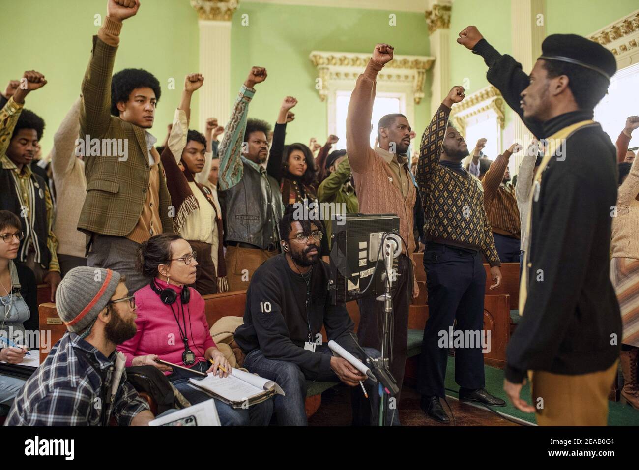 JUDAS AND THE BLACK MESSIAH, director Shaka King (center), on set, 2021 ...