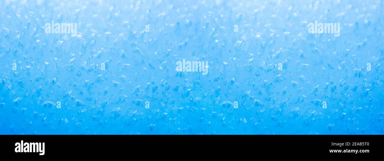 Blue blurred background made of ice crystals Stock Photo
