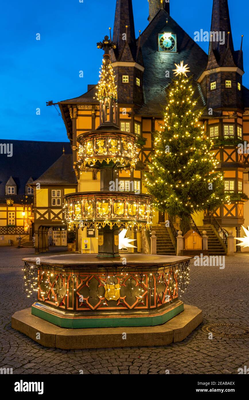 Germany, Saxony-Anhalt, Wernigerode, historic town hall, Christmas tree, neo-Gothic benefactor fountain. Stock Photo