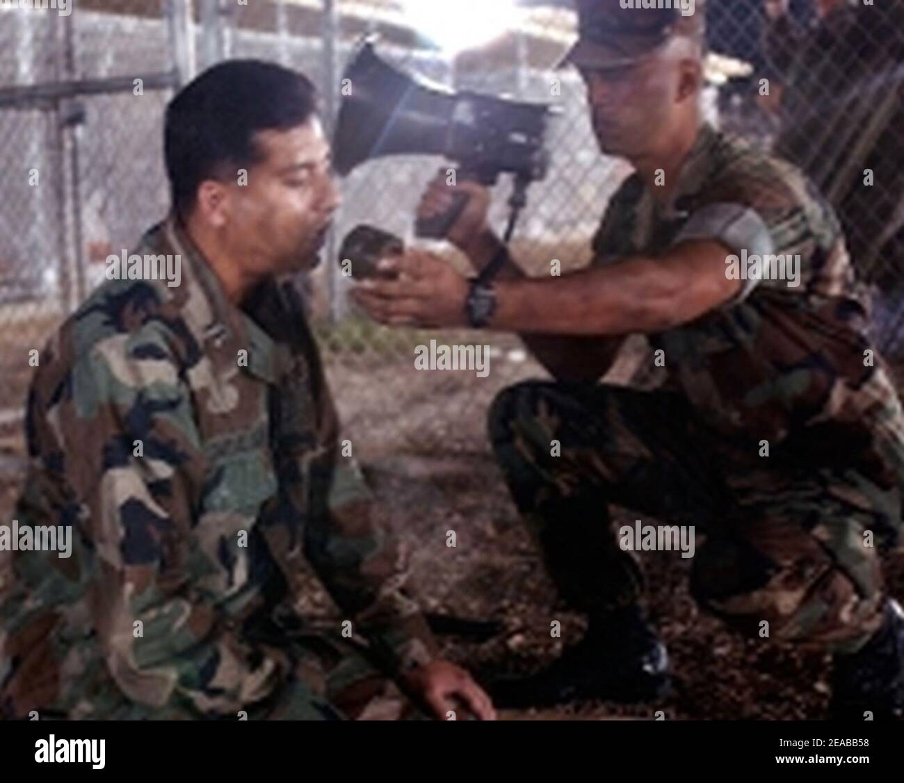 Navy Lt. Abuhena M Saiful prays with Guantanamo captives. Stock Photo