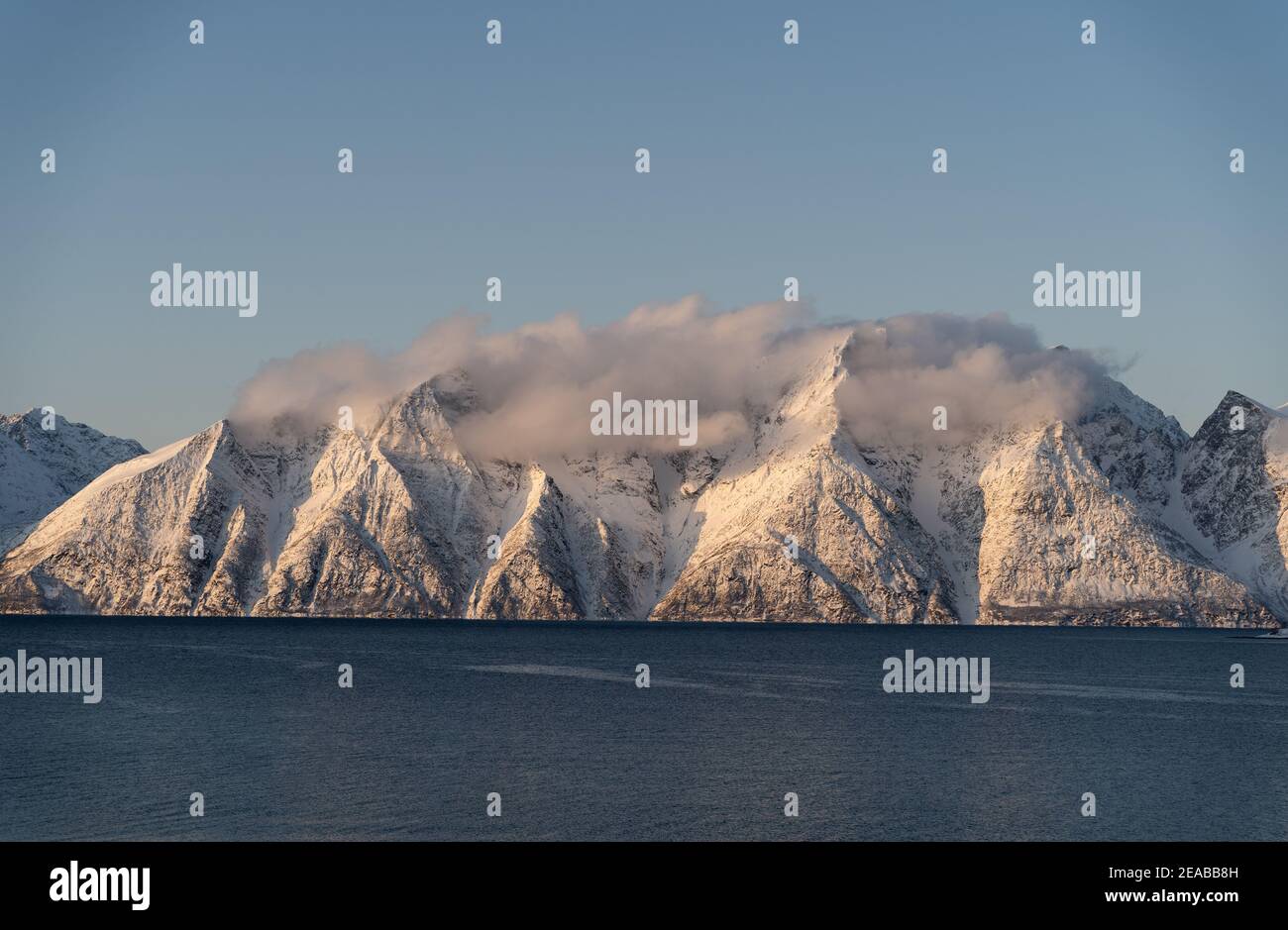 Norway, Nord-Norge, Winter, Mountain, Peaks, Sunset, Sky, Snow, Fjord, Sea, Fjord Stock Photo