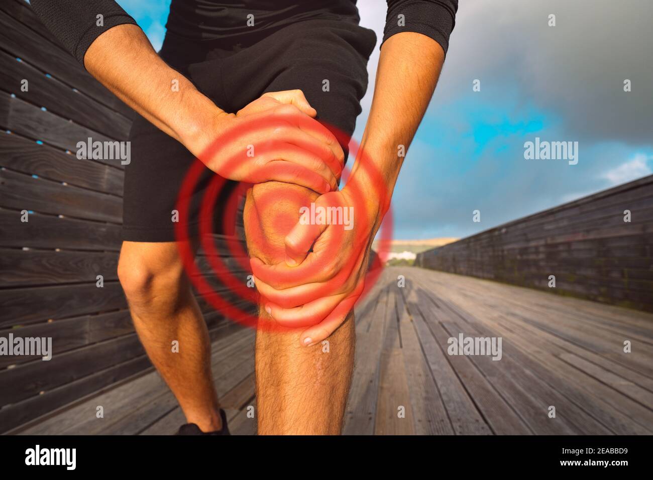 Man suffering from knee injury and pain. Meniscus Injury, dislocated knee, tendonitis Stock