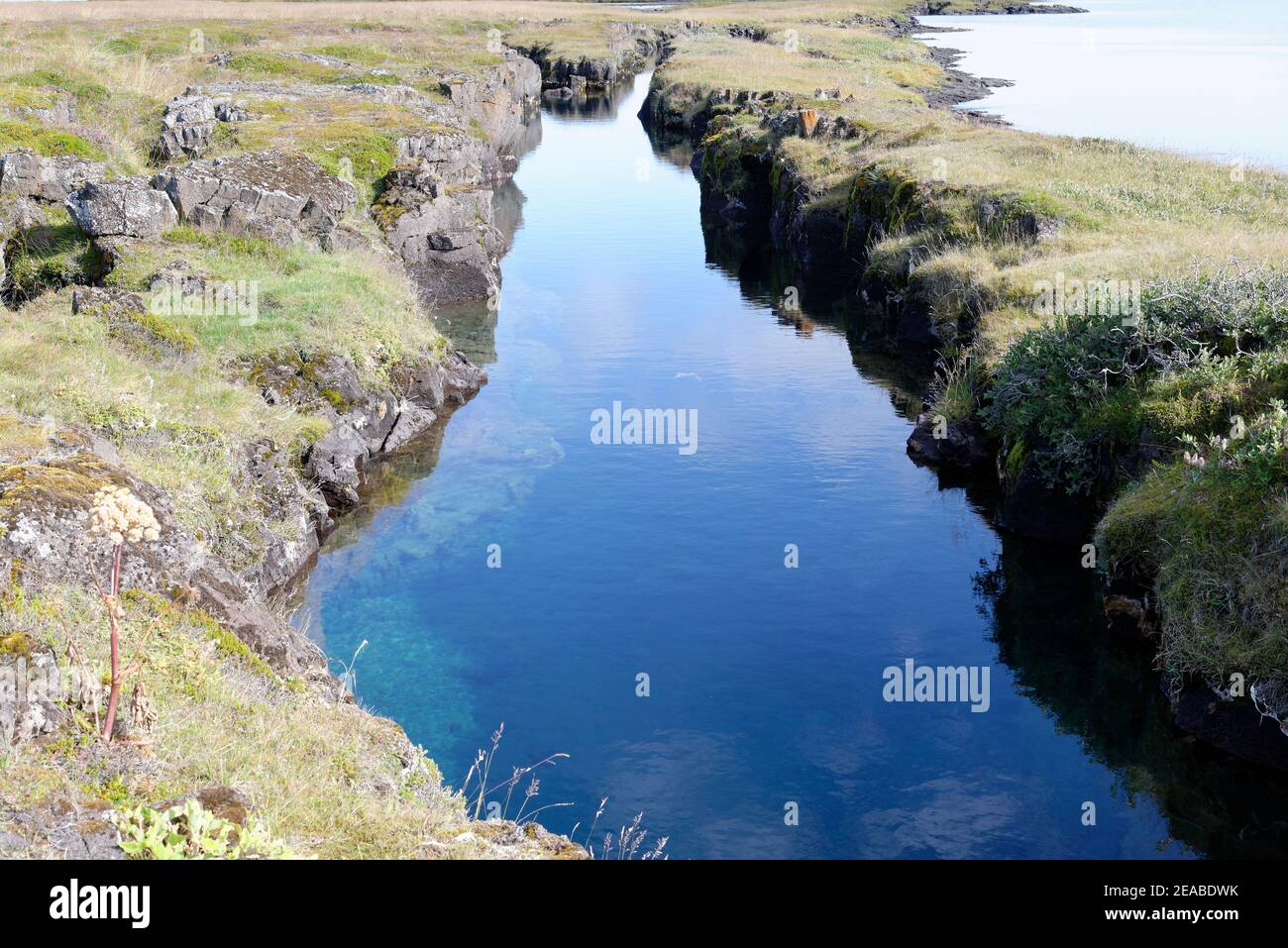 Nesgja, crystal clear freshwater fissure in Nesgja, small tectonic continental fissure between America and Eurasia, Akureyri, northern Iceland Stock Photo