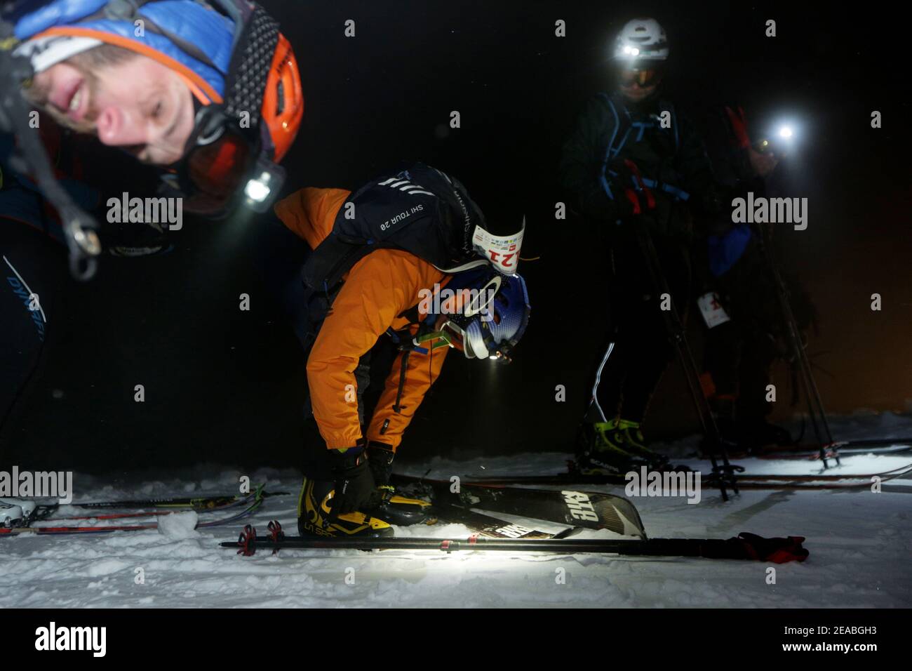 Szczyrk, Skrzyczne, Poland - February 6, 2021: Polish Cup in High Mountain Skiing Kuby Soinskiego - Night Vertical Race. Exhausted competitors at the Stock Photo