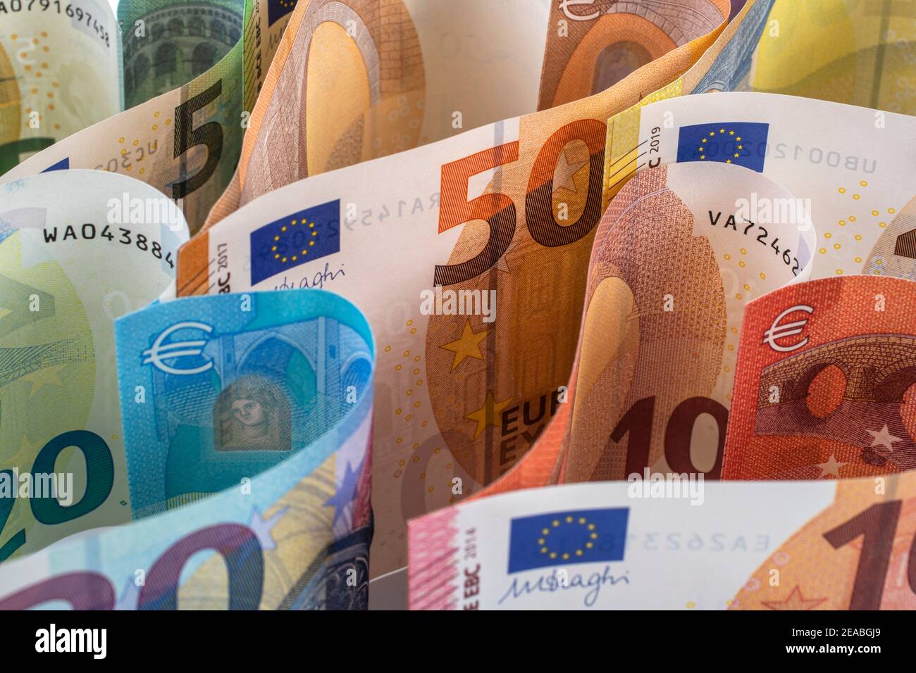 Different bank notes in the shape of heart, detail Stock Photo - Alamy