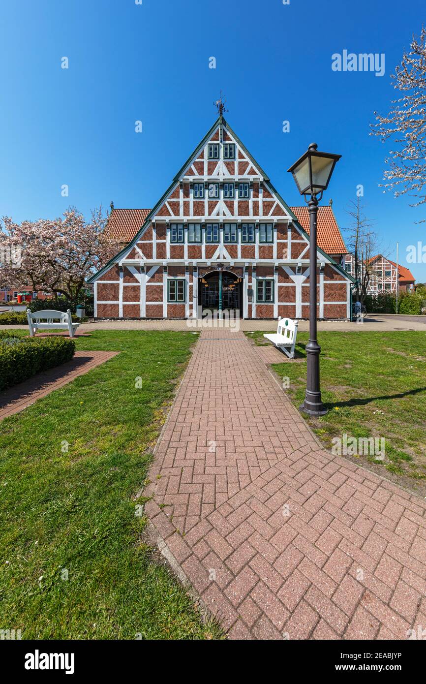 Tree blossom, half-timbered house, town hall in Jork, Altes Land, Stade district, Lower Saxony, Stock Photo