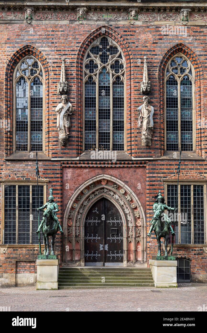 Old town hall, east portal, entrance, two armored knights on horseback, 'Herolde', by sculptor Rudolf Maison, Bremen, Stock Photo