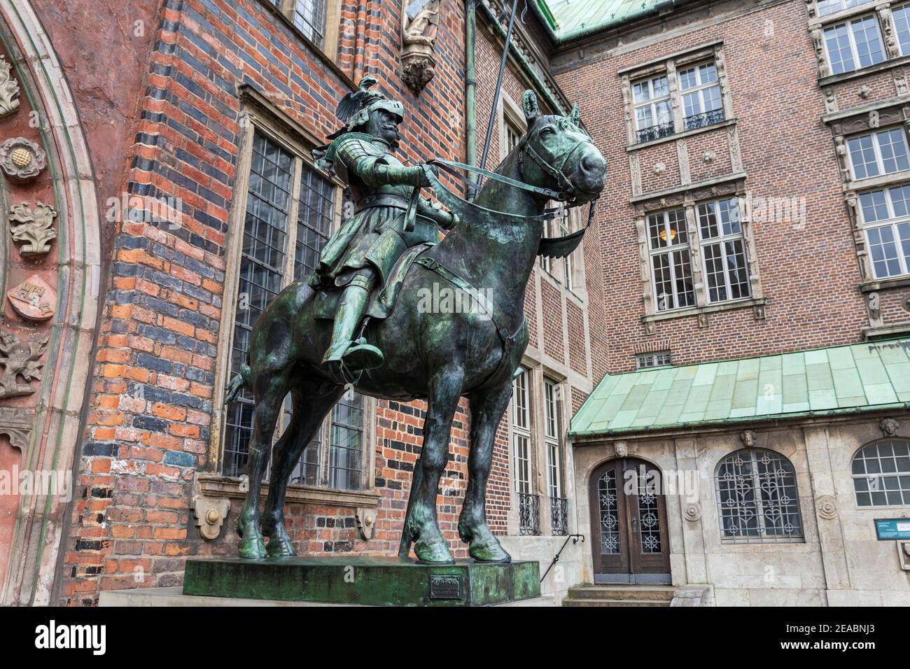 Old town hall, east portal, detail, one of the two armored knights on horseback, 'Herolde', by sculptor Rudolf Maison, Bremen, Stock Photo