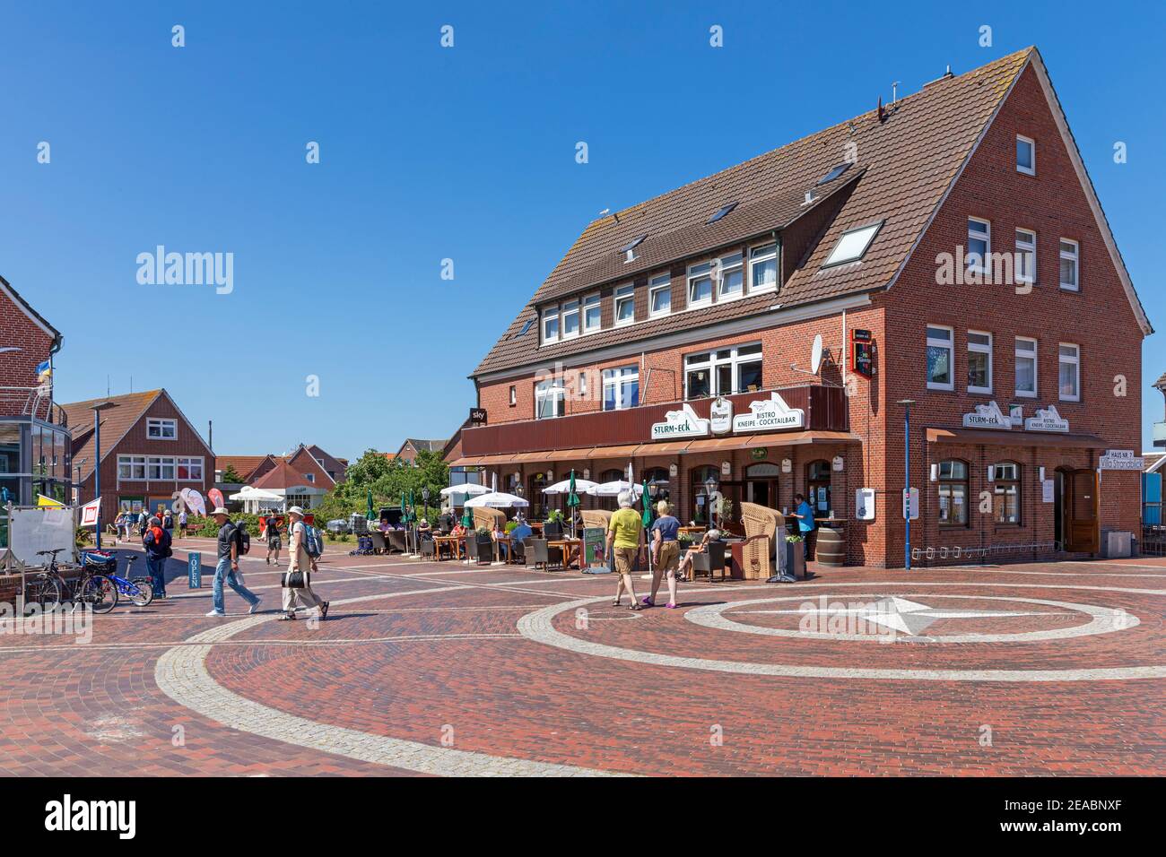 Town view, village square, village center, street cafe, shops, Westdorf, East Frisian island Baltrum, Lower Saxony, Stock Photo