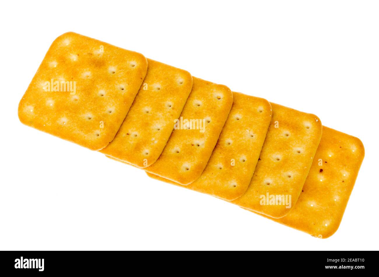 Delicious golden salt cracker cookies isolated on white background ...
