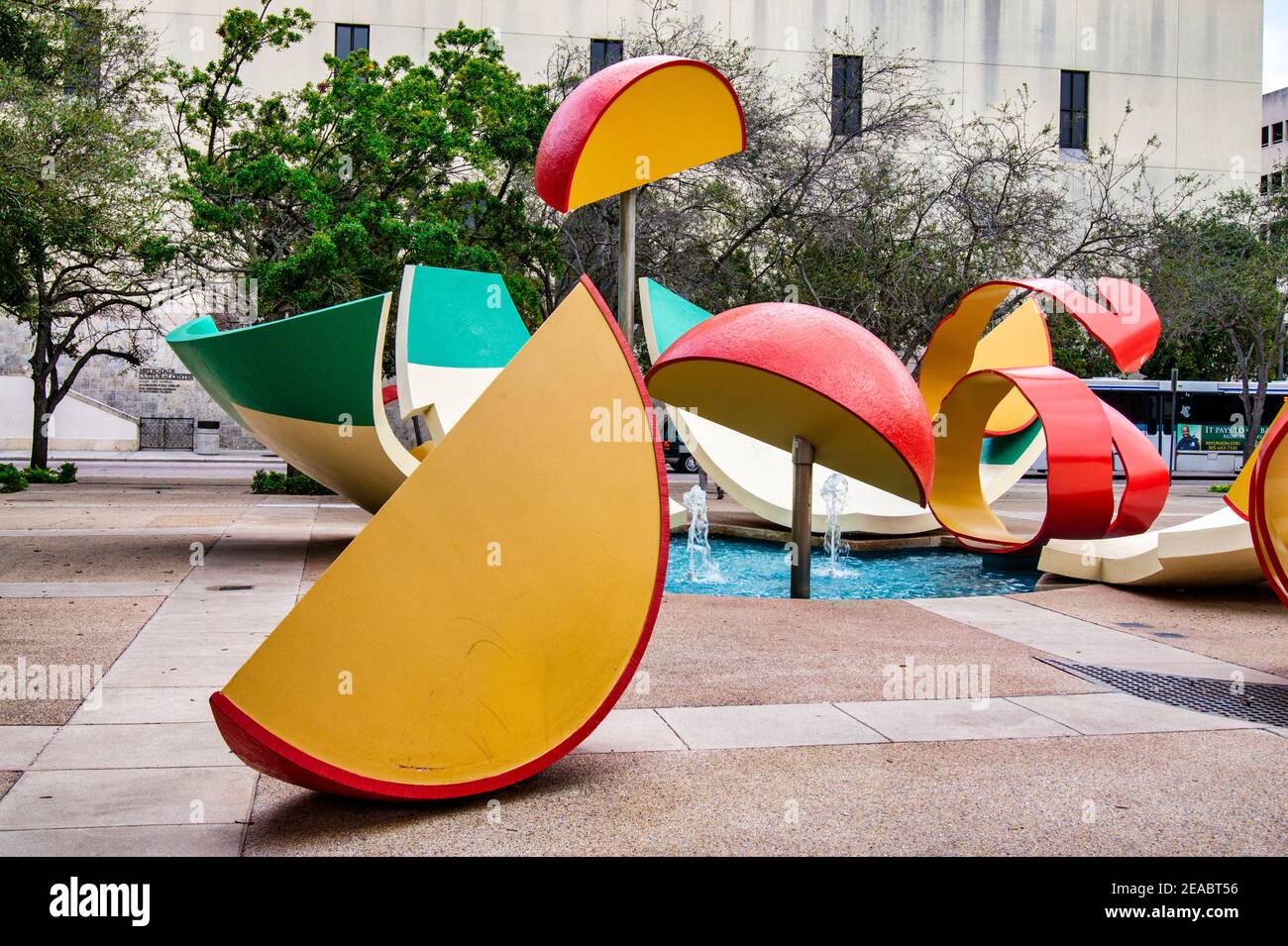 “Dropped Bowl with Scattered Slices and Peels” sculpture by Claes Oldenberg and Coosje Van Bruggen at The Stephen P. Clark Government Center in downto Stock Photo