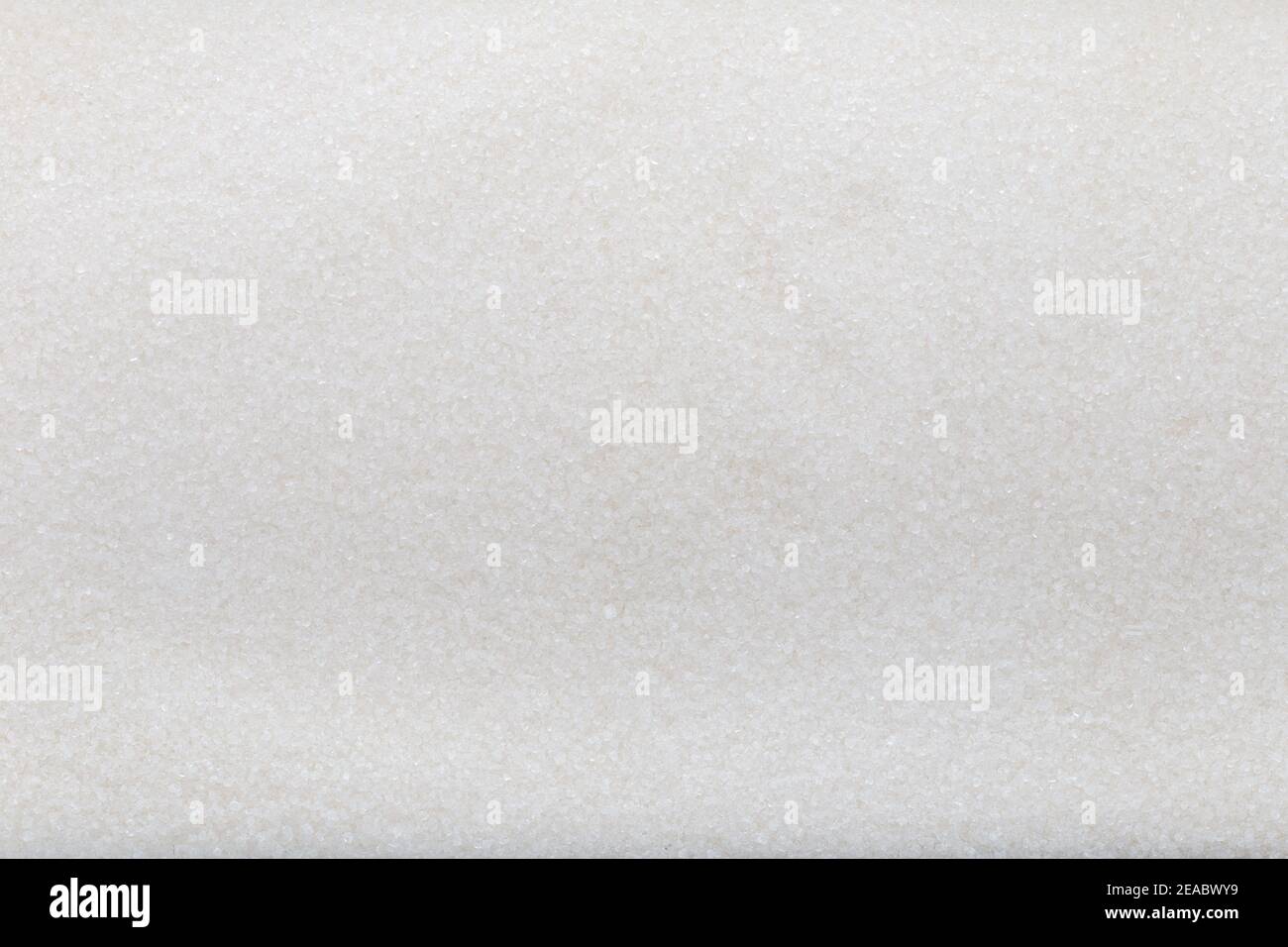 Granulated sugar. Pile of sugar closeup. Background and texture Stock