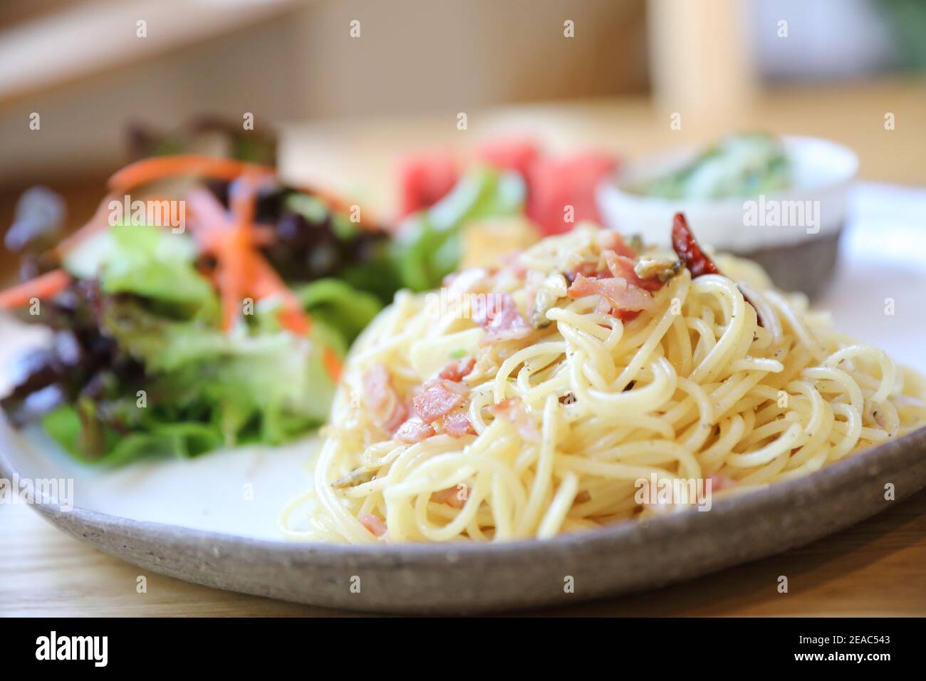 Spaghetti with mussels and ham in japanese style Stock Photo