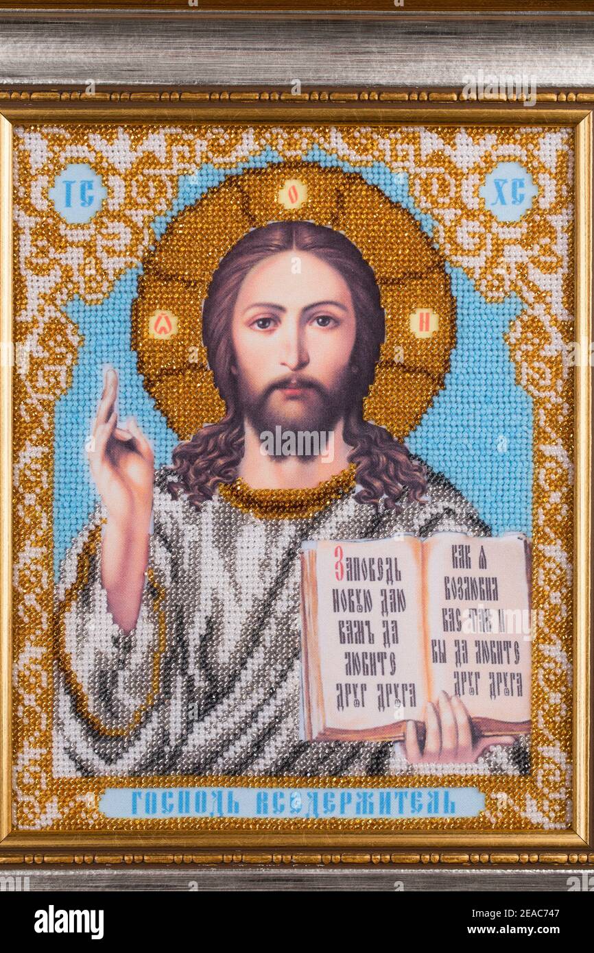 Representation of Jesus Christ face to glass beads. Full background. Stock Photo