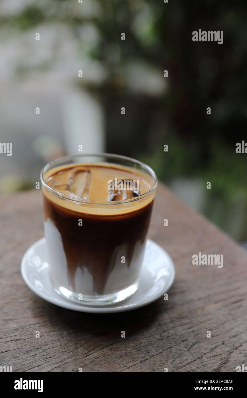 ice latte coffe on wood in coffee shop Stock Photo