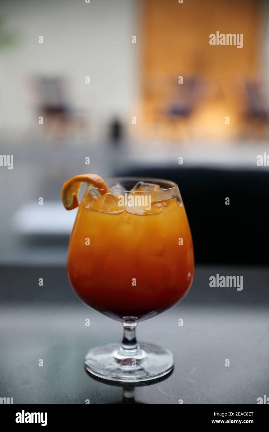 Sunrise Cocktail orange pineapple juice in restaurant Stock Photo