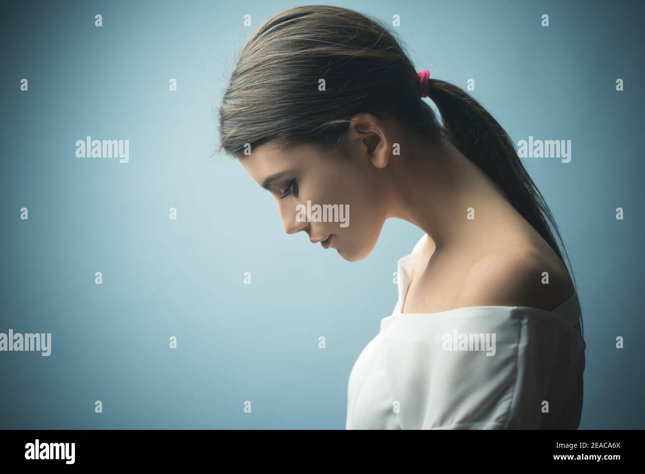 Sadness. Sad woman look down. Depression and life problems Stock Photo -  Alamy