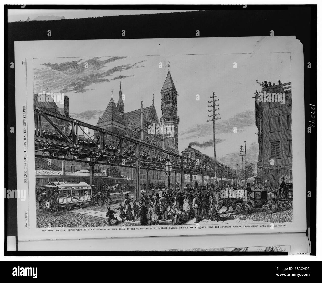 New York City-The development of rapid transit - the first train on the Gilbert Elevated Railroad passing through Sixth Avenue, near the Jefferson Market Police Court, April 29th Stock Photo