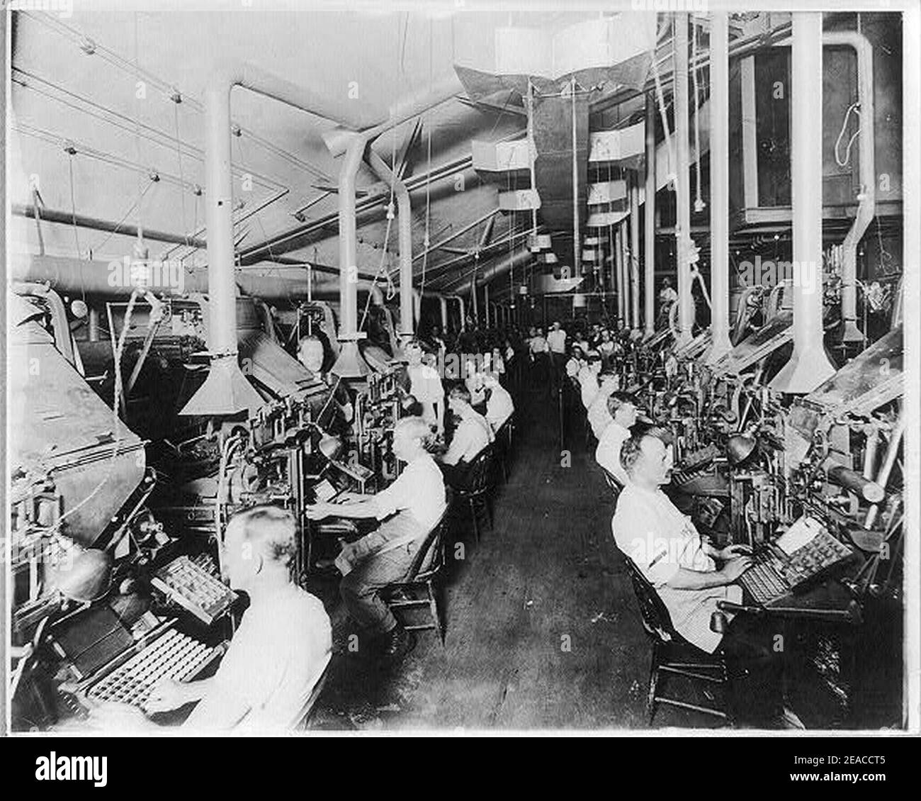 Newspaper publishing - N.Y. Herald- Composing room and linotype machines Stock Photo