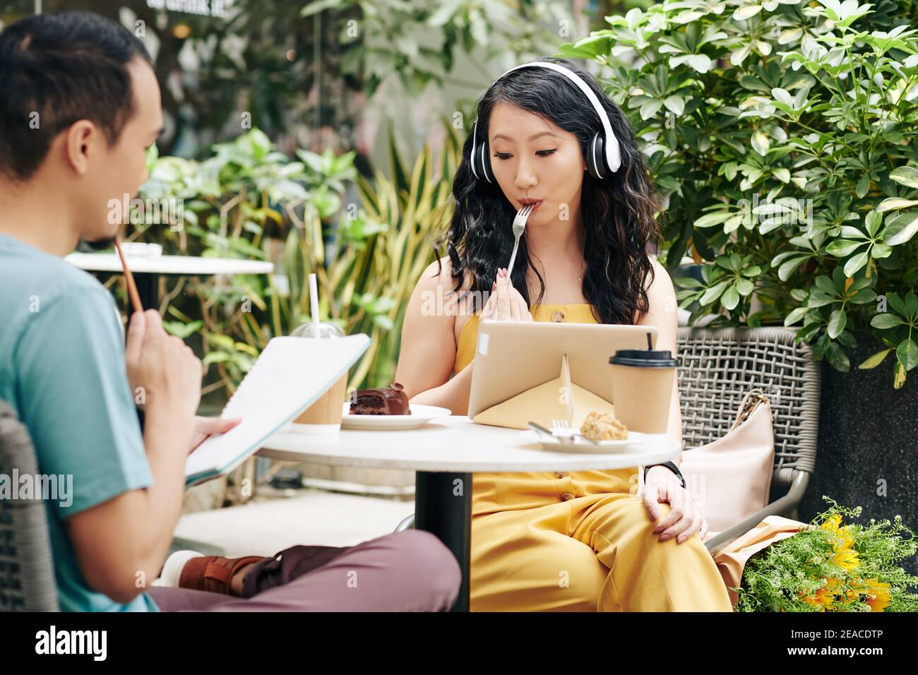 Couple studyig in cafe Stock Photo