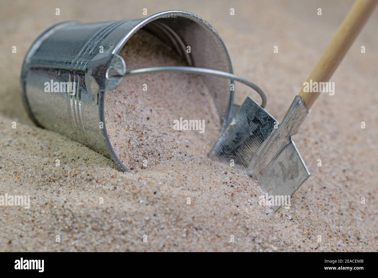 Bucket with quartz sand and shovel Stock Photo