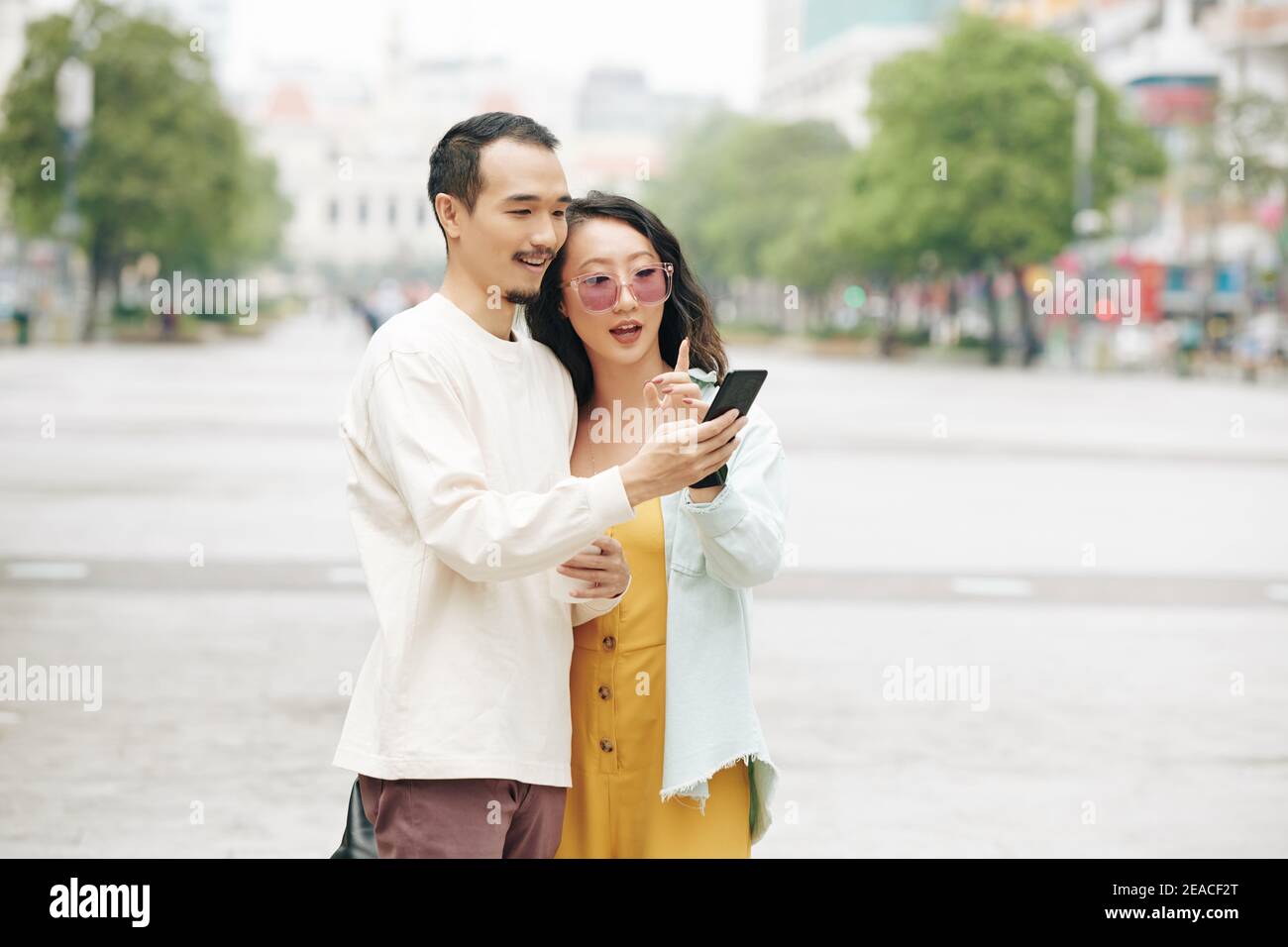 Couple checking application Stock Photo