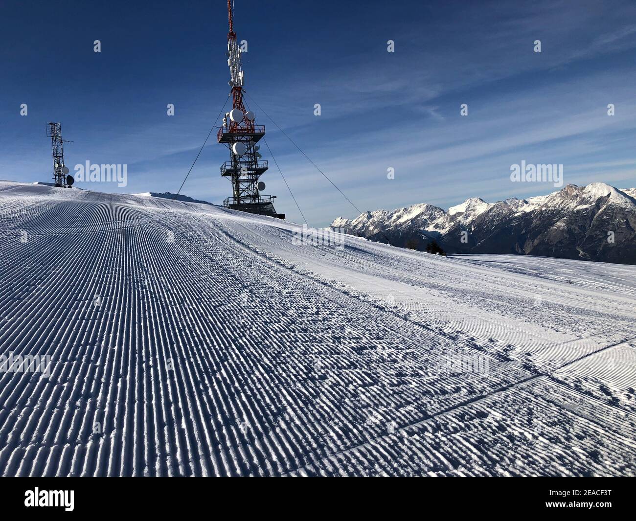 Antennas at Rangger Köpfl, summit, freshly prepared ski slope, snow, winter, Rangger Köpfl ski area, Oberperfuss, Tyrol, Austria Stock Photo