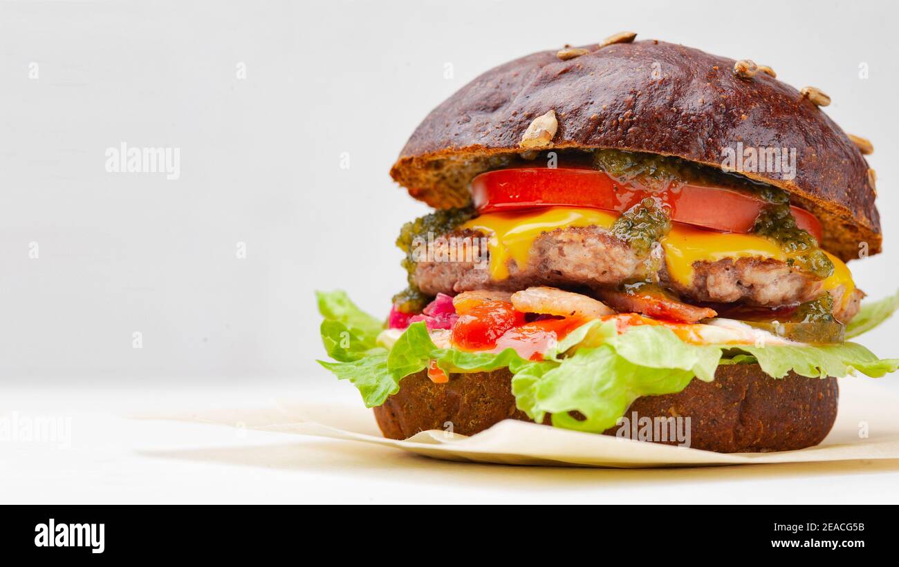 rye bun hamburger on the white background Stock Photo