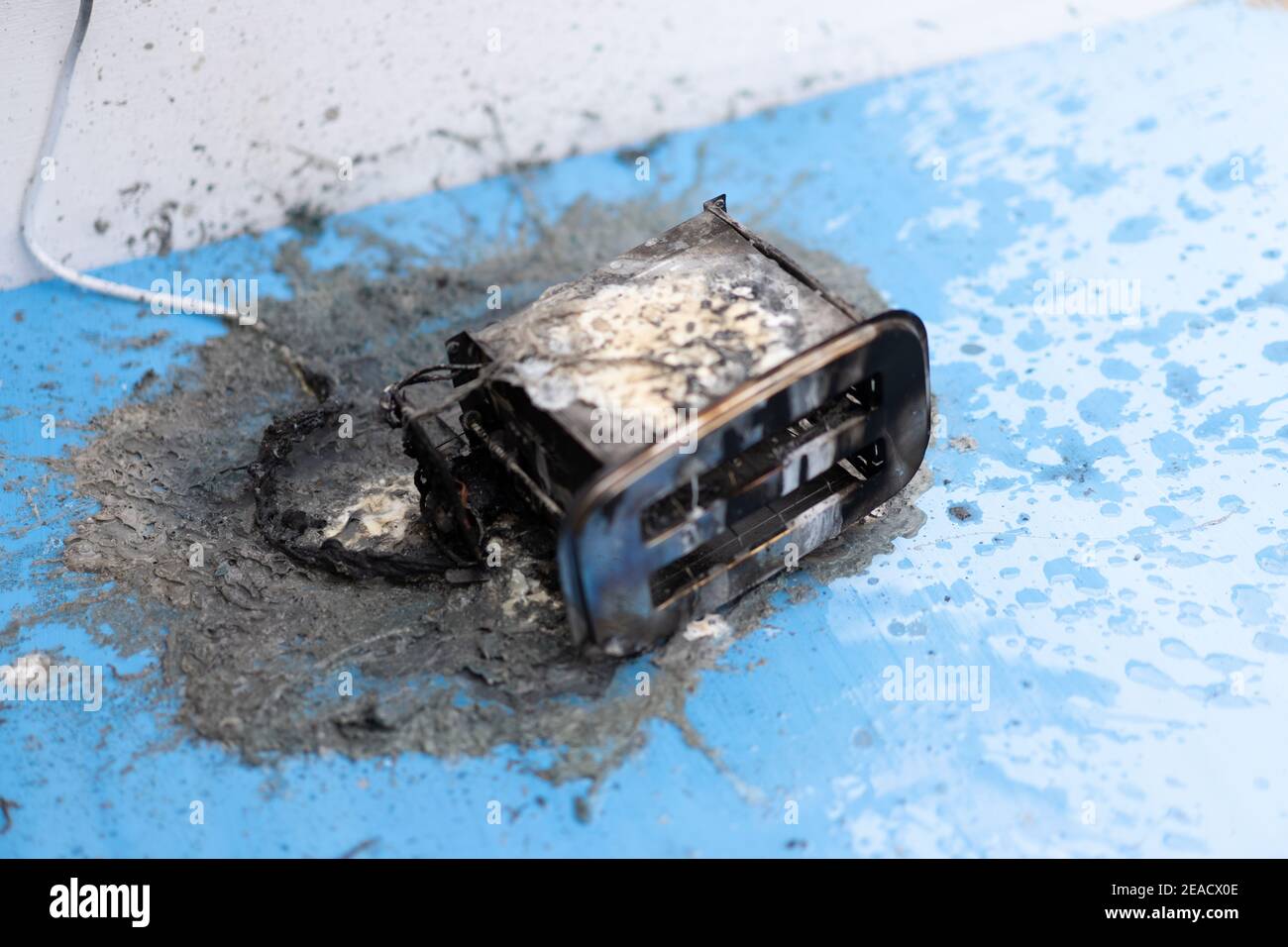 Toaster after fire. Household electrical appliance fire hazard