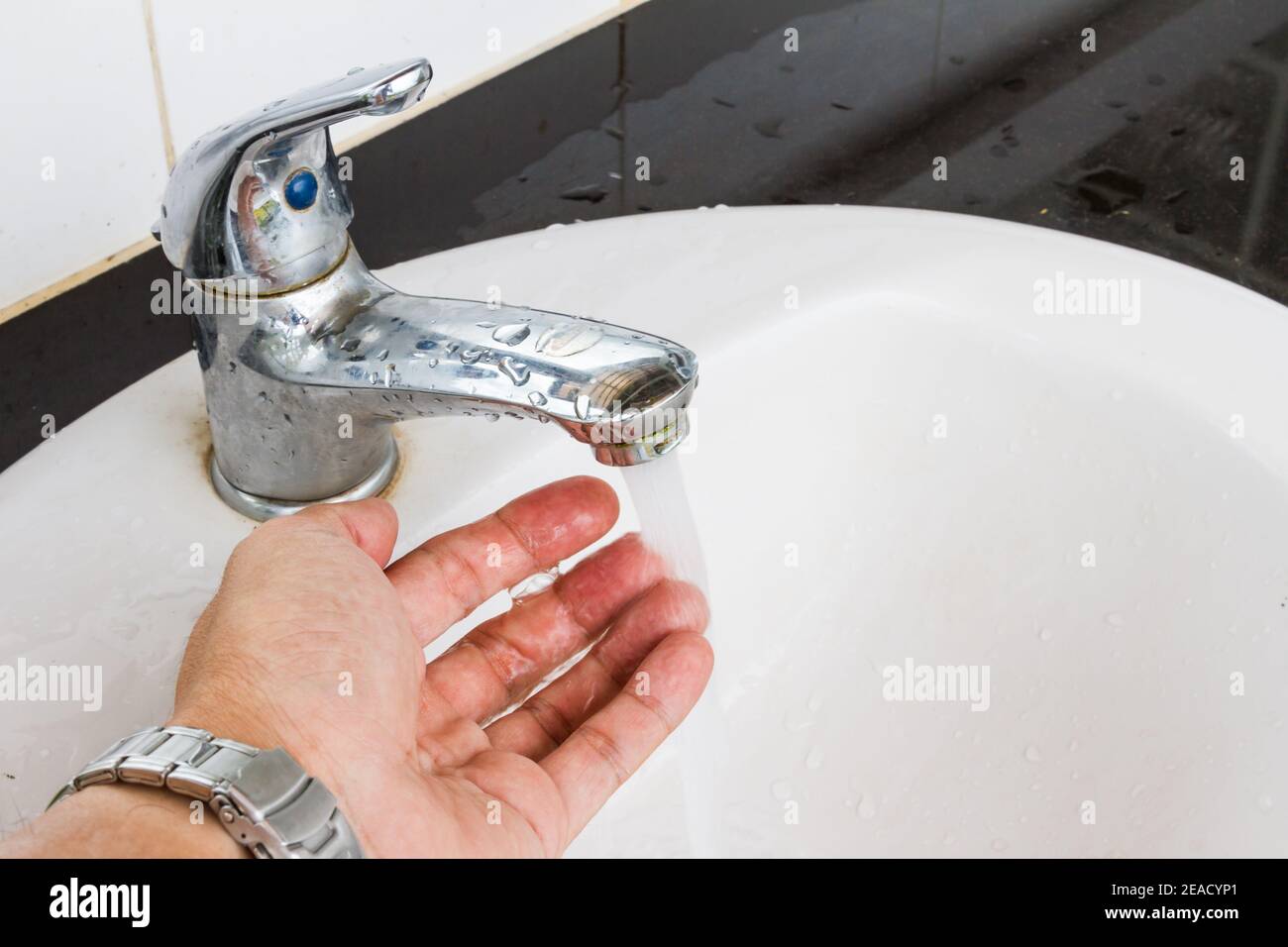 Washing hands in a public restroom, public sinks Stock Photo Alamy