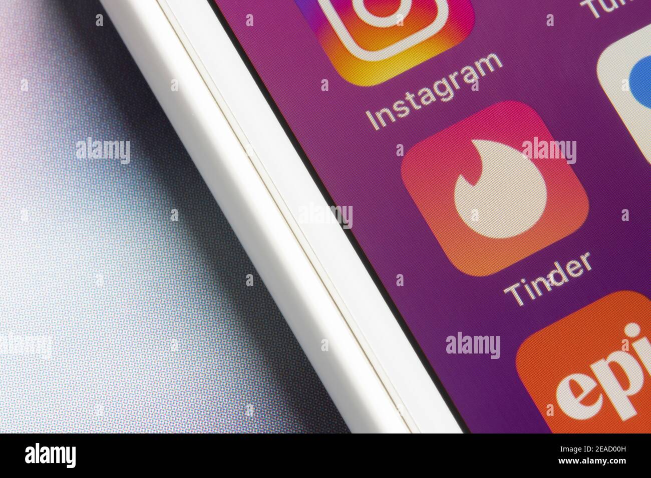 Tinder app icon is seen on an iPhone on February 8, 2021. Tinder is a geosocial networking and online dating app. Stock Photo