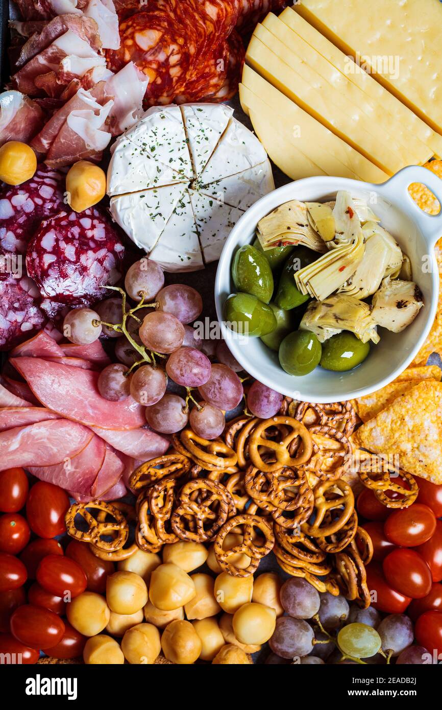 Charcuterie and cheese platter. Appetizers tray with assorted meats