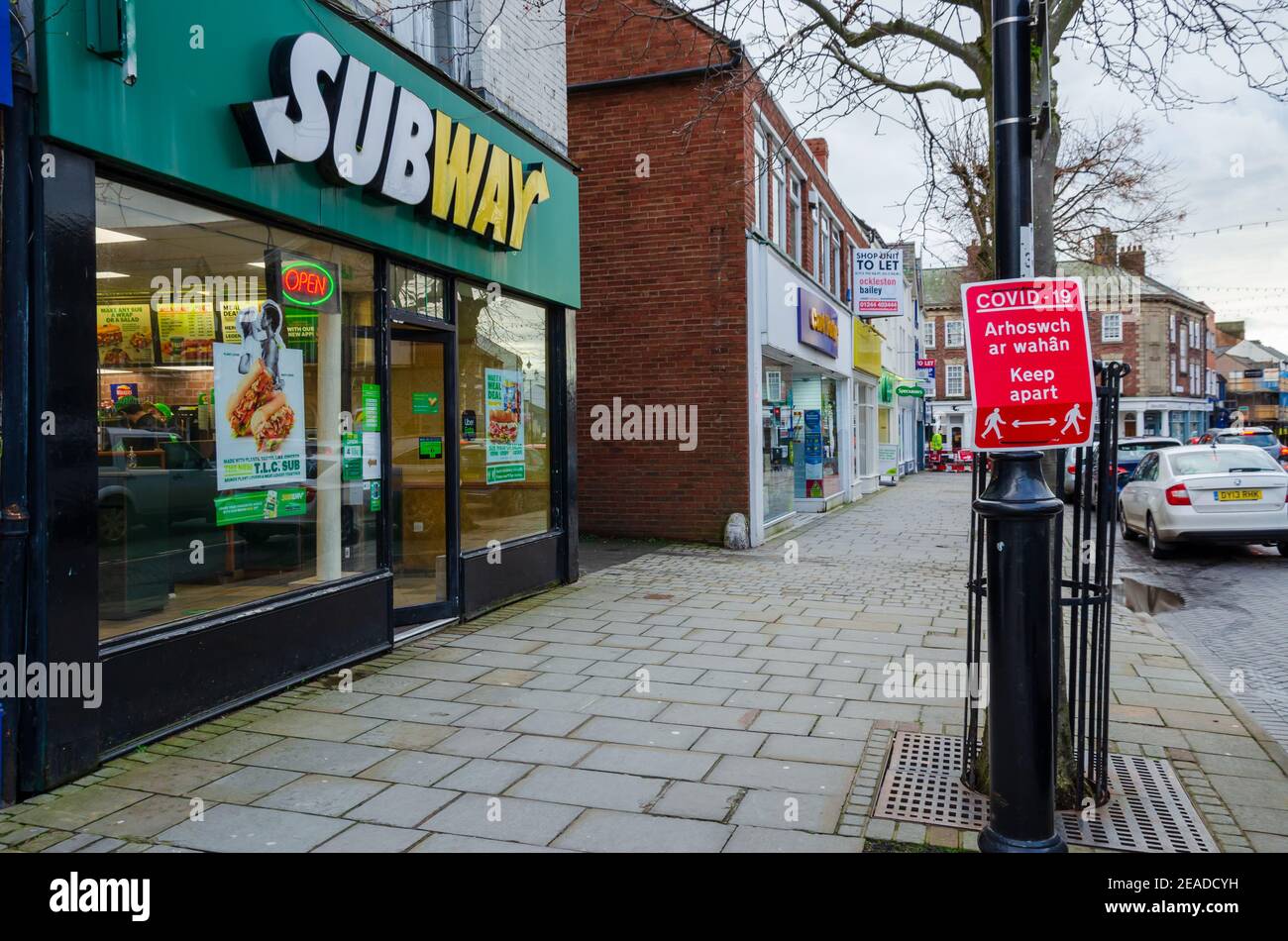 Mold, Flintshire; UK: Jan 28, 2021: A very quiet Mold town centre on a Thursday afternoon. Take away businesses are allowed to continue trading Stock Photo