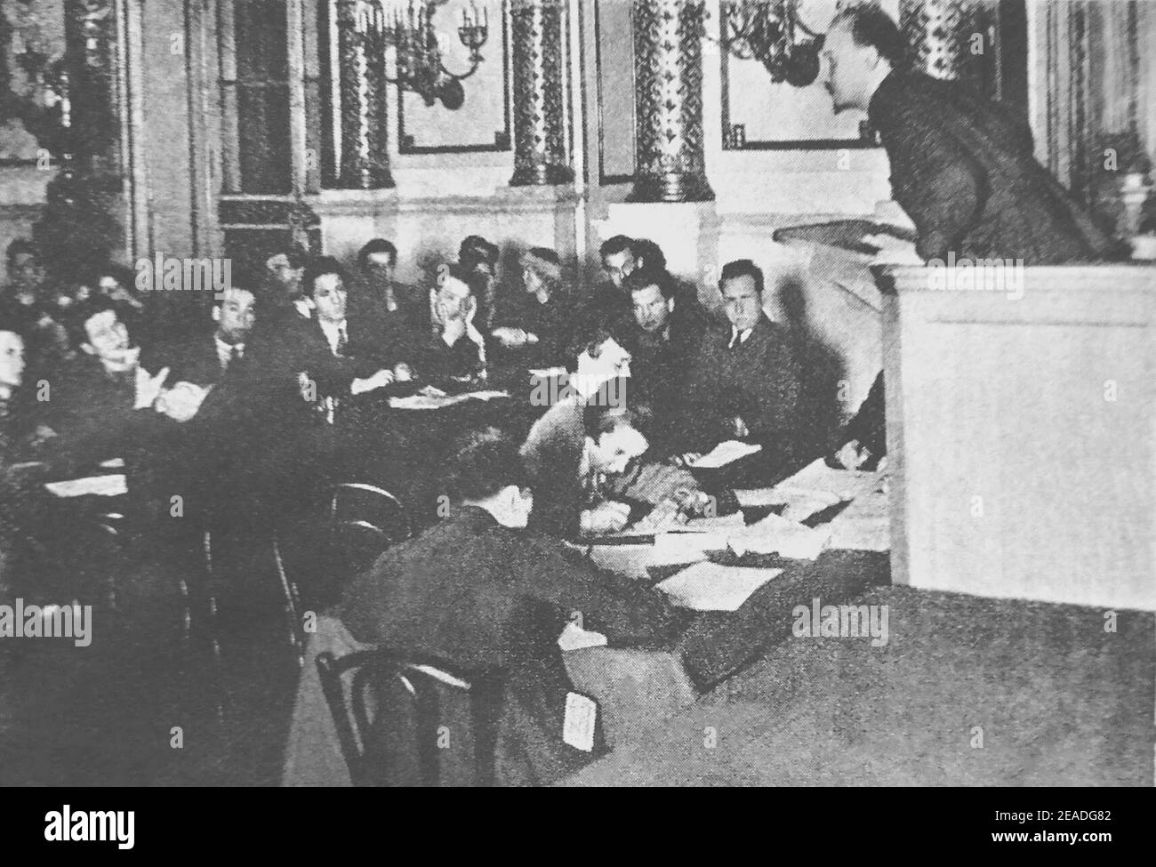 Nikolai Bukharin delivers the welcome speech on the meeting of Young Communist International 1925. Stock Photo