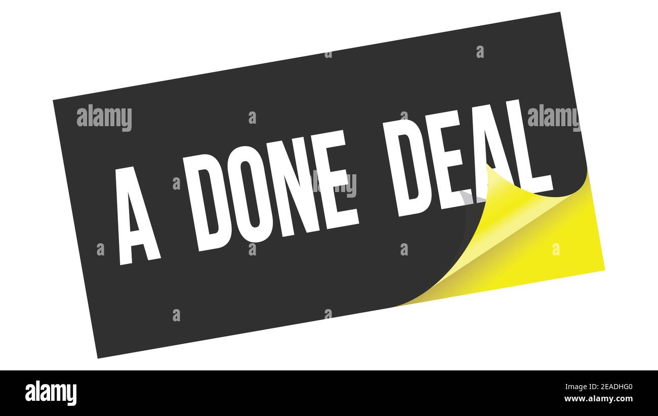 A  DONE  DEAL text written on black yellow sticker stamp. Stock Photo