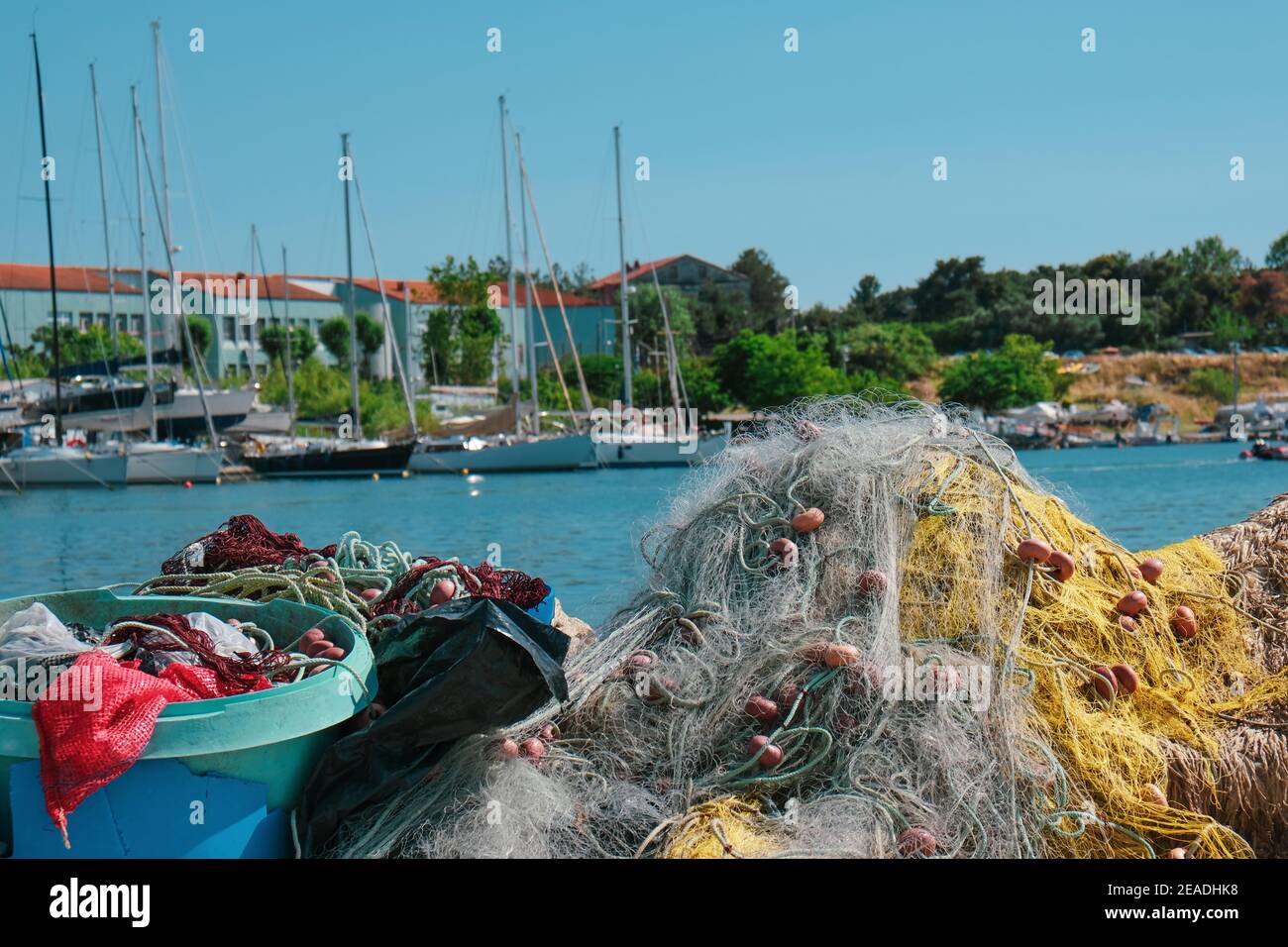 Traditional fishery harbor in greece with multiple colourful fish nests Stock Photo