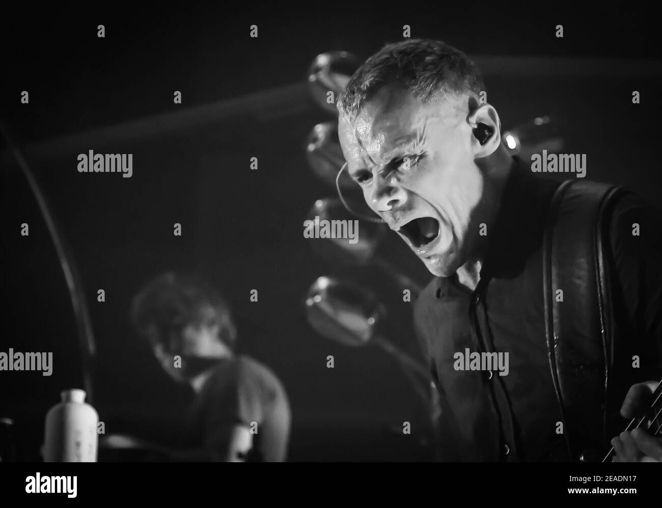 Red Hot Chilli Peppers bassist Flea on stage as part of Atoms for Peace live on stage at the Roundhouse in London Stock Photo