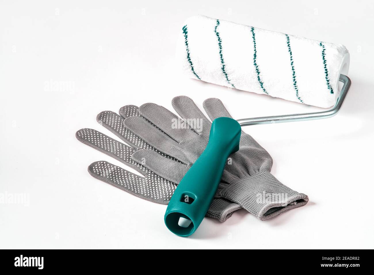 Paint roller, protective gloves, everything for repair and painting