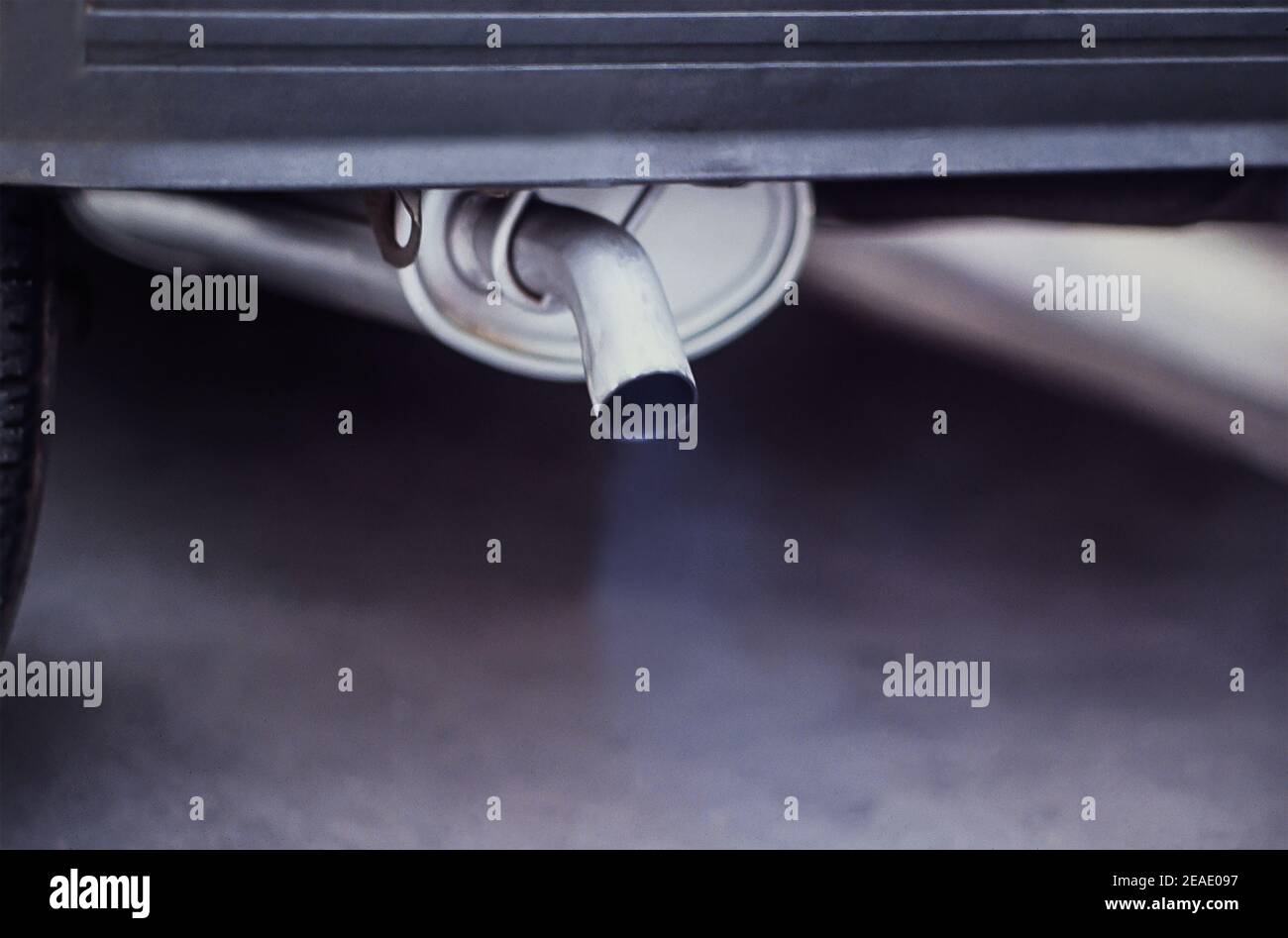Smoke coming out of car exhaust pipe Stock Photo Alamy