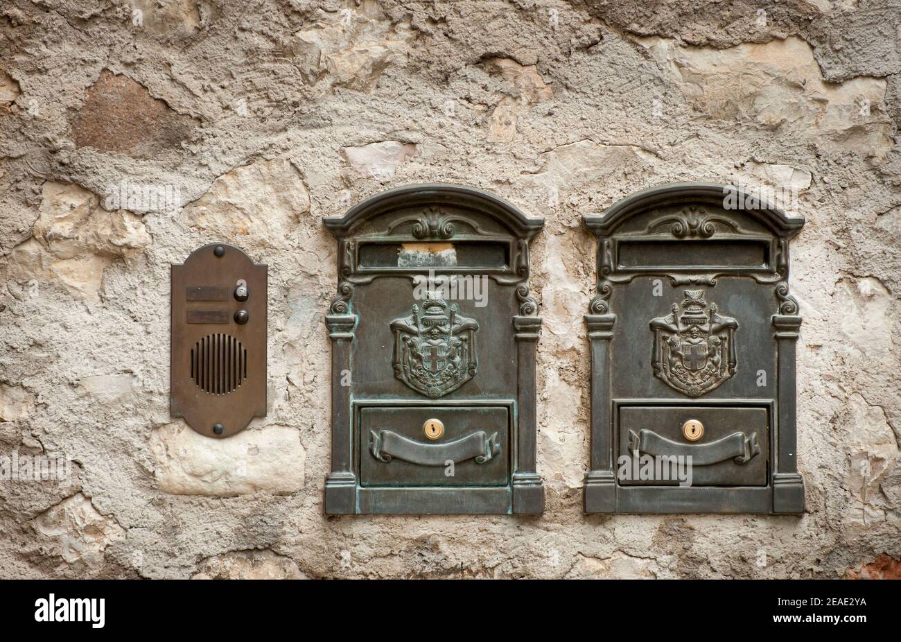 Letterboxes outside an apartment block in Malcesine, Lake Garda, Italy. Stock Photo