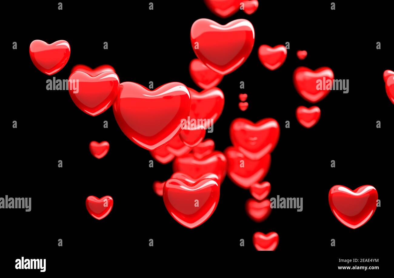 shiny red hearts on a black background Stock Photo - Alamy