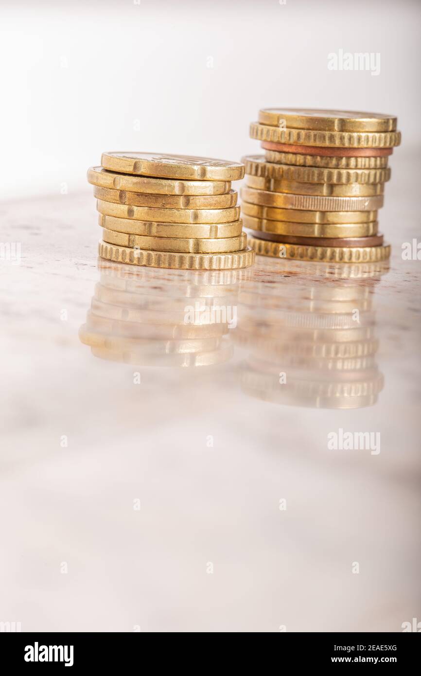 Gold coins cash money in piles, Isolated on white background Stock ...